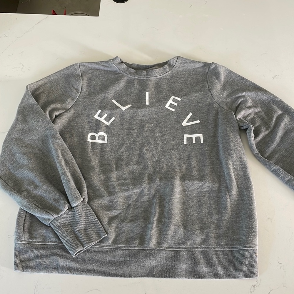 believe sweatshirt